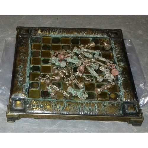 48 - South African souvenir bronze chessboard and pieces, incomplete