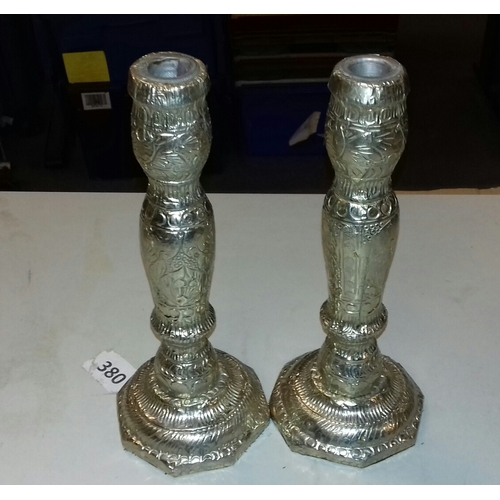 26 - 28 cm tall pair of wrapped silver coloured metal candlesticks