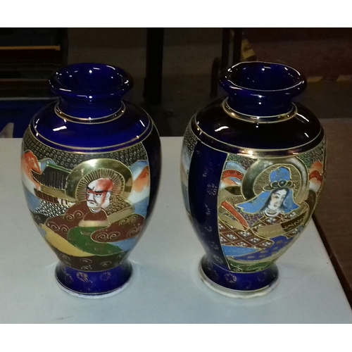 136 - Pair of 26 cm tall Japanese decorated cobalt blue vases