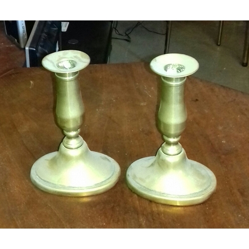 132 - Pair of 15 cm tall 1800's brass candlesticks