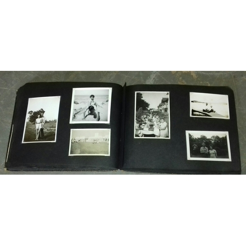 94 - Vintage photo album with assorted black and white family portrait and holiday photographs etc.