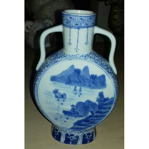 34 - 21.5 cm tall two handled blue and white patterned Chinese vase