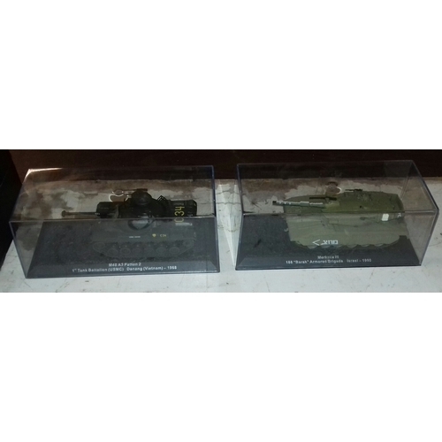 195 - 2 x die cast military tanks in perspex display cases