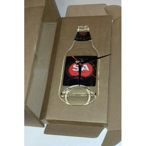 288 - New and boxed Brains brewery flat bottle wall clock