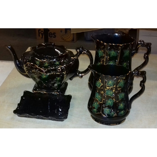 53 - Vintage Jackfield pottery teapot with stand (nick on the spout) and graduated pair of jugs