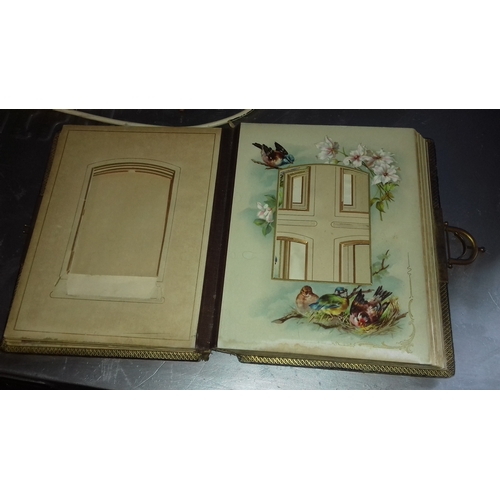 298 - Slightly distressed Victorian photograph album