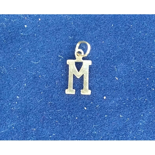 576 - 9k stamped 1 cm long  letter M initial pendant (1 gram)