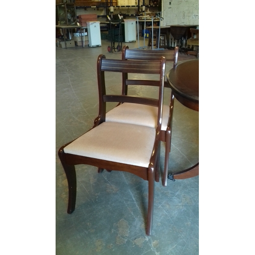 404 - Mahogany dual pedestal dining table with 4 x chairs and 46 cm extending centre piece. Kept covered s... 