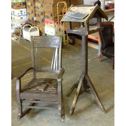 292 - Weathered wooden garden rocking chair and bird house, both for restoration