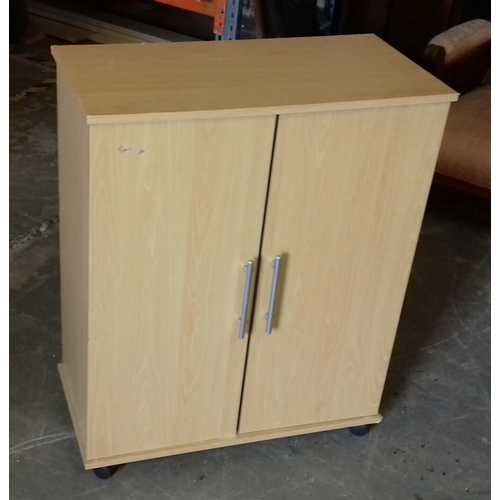 323 - 70 x 35 x 86 cm tall beech veneered 2 door cupboard on casters