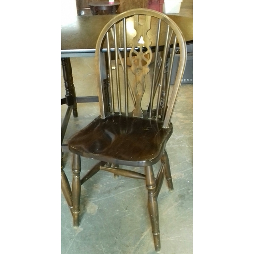 383 - 150 x 88 cm dark oak ercol style drop leaf dining table with 4 x wheel back dining chairs