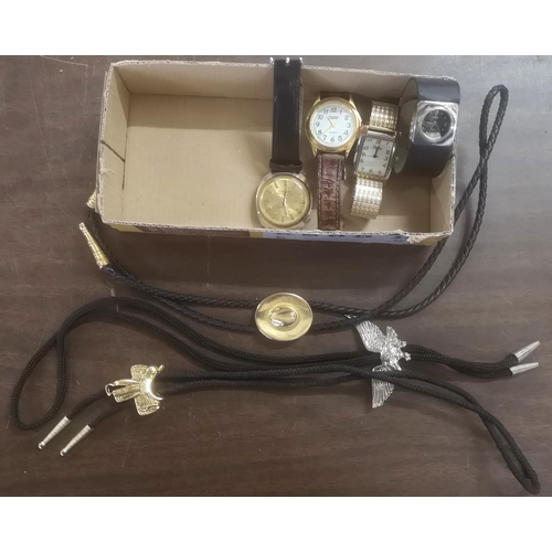 33 - 4 x assorted wrist watches and 3 x cowboys Bolo neck ties