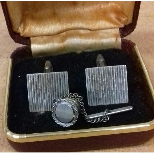 518 - Pair of hallmarked silver cufflinks and similar stud