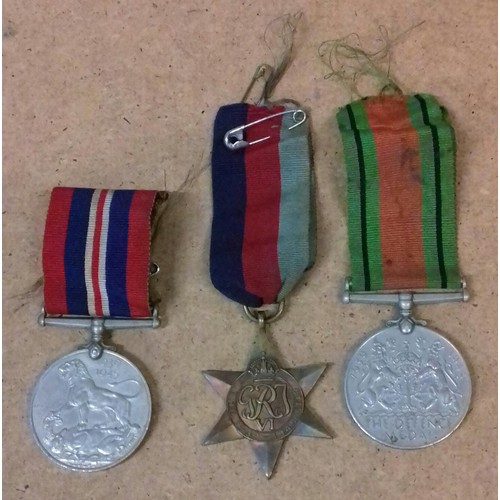 513 - row of 3 x WWII medals being 1939-45 medal, 1939-45 star and defence medal, all with ribbons