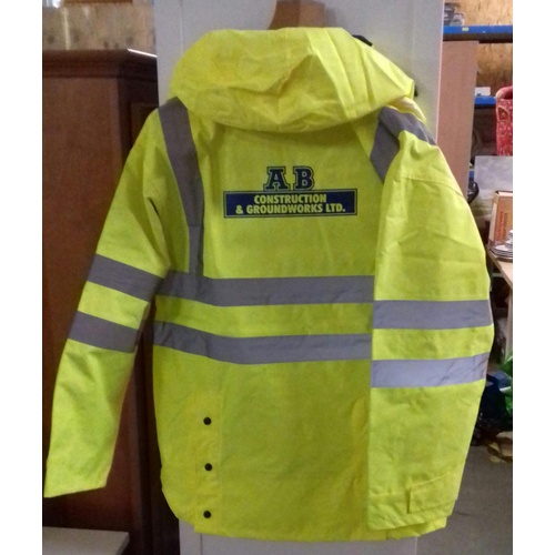 305 - New and tagged JSP hi-viz lightweight waterproof outer coat size M with AB construction advertising