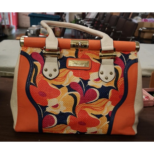 241 - River Island orange and cream floral pattern hand bag