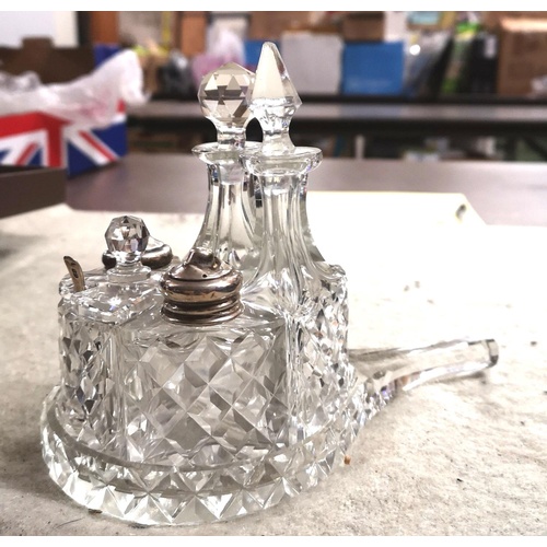 150 - 1920's cut glass condiment set with hallmarked silver tops