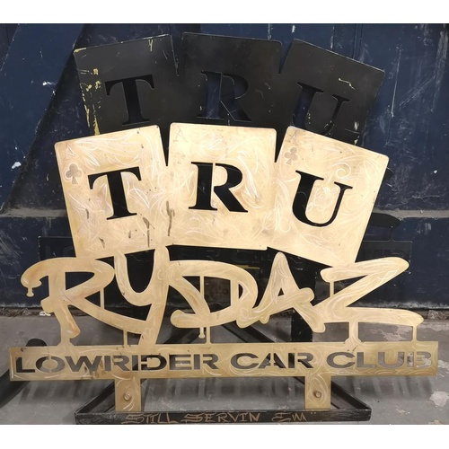 107 - 88 cm wide and 61 cm tall Tru Rydaz Lowrider Car Club metal sign on stand and 1 slightly larger simi... 