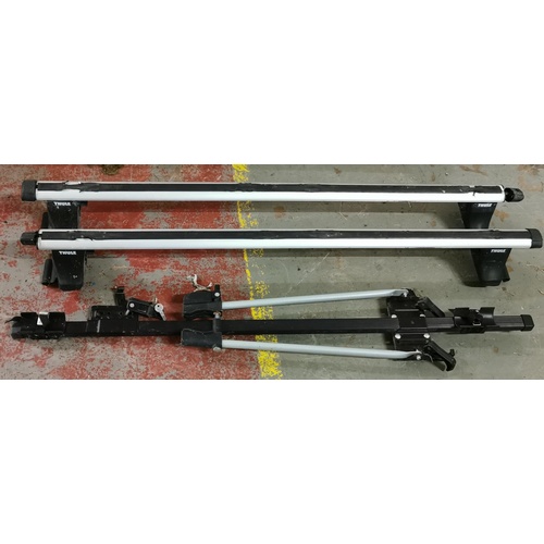 335 - Pair of Thule aluminium roof bars plus lockable bike rack with keys