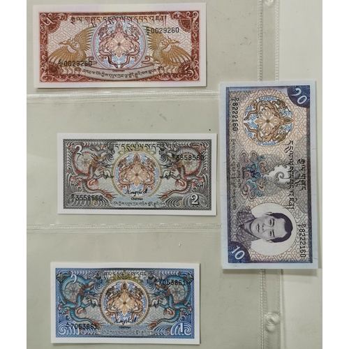 61 - 4 x bank of Bhutan banknotes in near mint condition