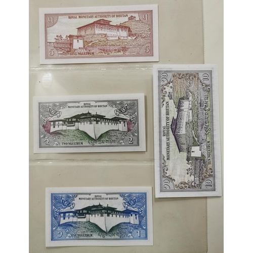 61 - 4 x bank of Bhutan banknotes in near mint condition