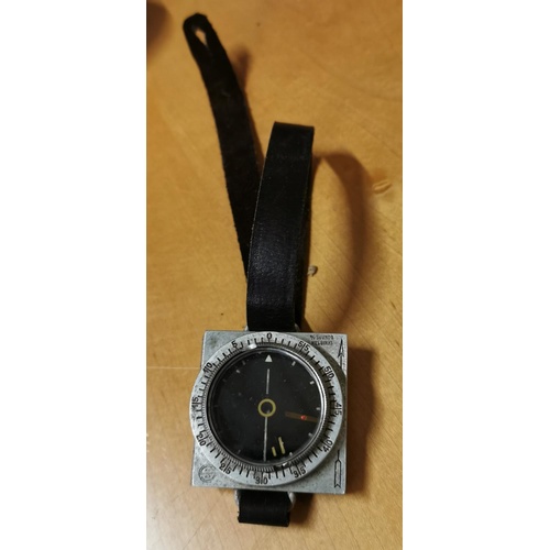 37 - Approx 5 x 5 cm vintage Suunto Helsinki compass with wrist strap