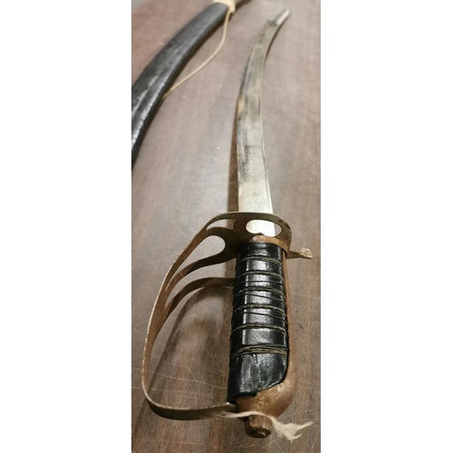 17 - Indian Steel curved blade sword in hard sheath