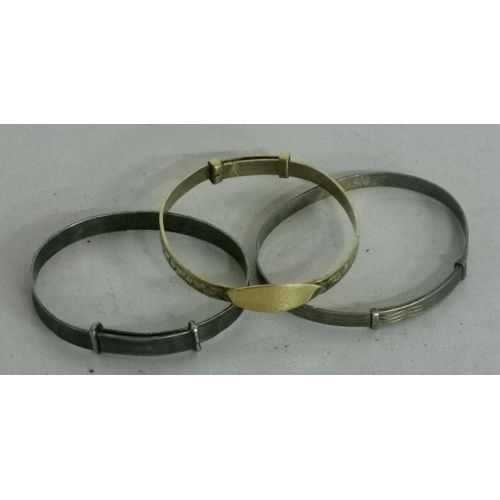 92 - 3 x silver childs extending bangles