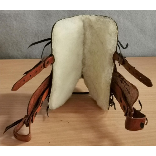 81 - Approx 14 cm long Spanish leather ornate patterned miniature saddle
