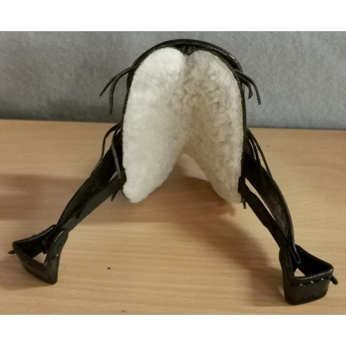 82 - Approx 14 cm long Spanish leather ornate patterned miniature saddle