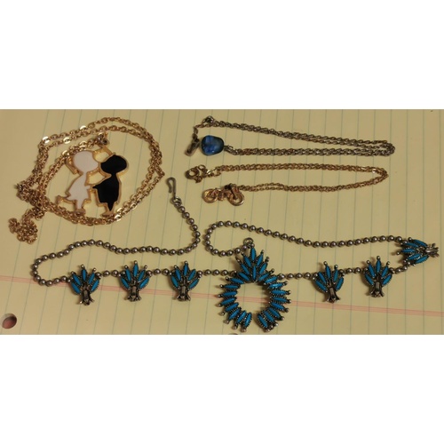 69 - 4 x assorted gold tone and other costume jewellery necklaces and chains with pendants