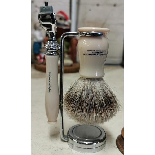 130 - Charles Tyrwhitt razor and shaving brush on stand