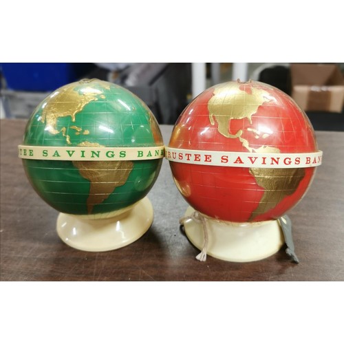 243 - 1 x red and 1 x green vintage globe shaped TSB saving banks with 1 x key