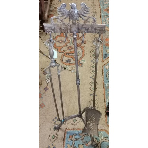 39 - 3 ft ornate brass fireside tool stand with some tools