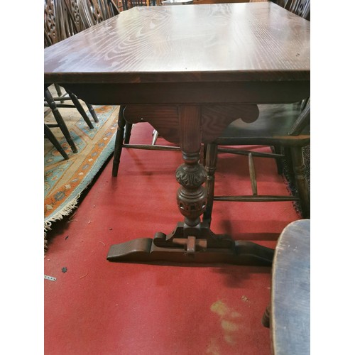 56 - Dark oak refectory table and 6 x wheel back chairs