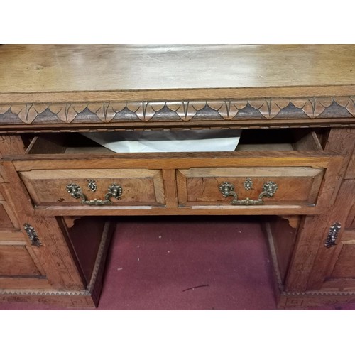 96 - 198 x 59 x 228 cm tall 19th century sideboard with intricate carving and illusion central double doo... 