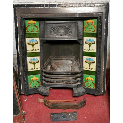 220 - 97 cm wide and 98 cm tall original Art Nouveau tiled side cast iron fireplace