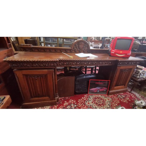 491 - 259 x 83 x 132 cm tall turn of the century oak linen fold buffet cabinet with carved back panel cent... 