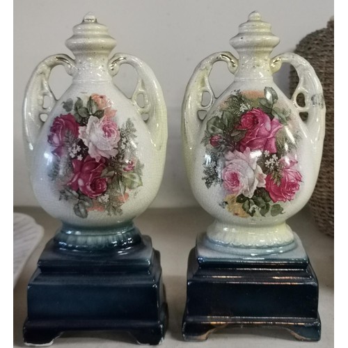 692 - Pair of 29.5 cm tall floral pattern garnitures