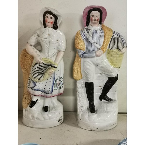 703 - Pair of 33 cm tall Staffs flatback male and female fish seller figures