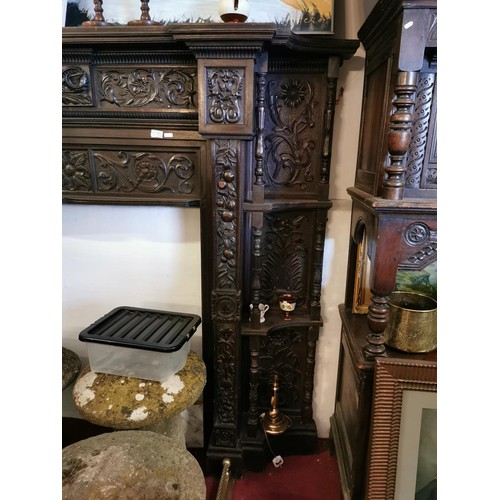 576a - Very heavily carved late 19th century Welsh oak fire surround measuring approx 250 x 197 cm, stunnin... 