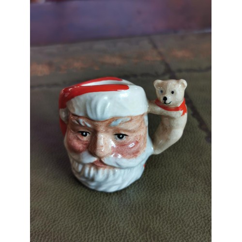 757 - Rare 4 cm tall Royal Doulton D7060 Santa Claus character jug