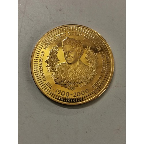 77 - 4.5 cm diameter 2000 Queen Mother centenary/Glamis Castle Angus gold plated coin