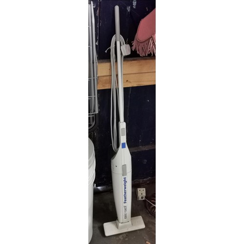 106 - Bissell featherweight upright compact vac