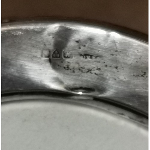 218 - Approx 13.5 cm diameter silver framed desk top picture frame with well worn Chester hallmark