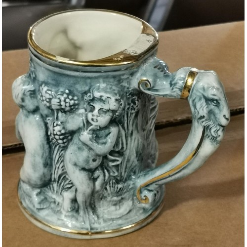141 - 13 cm tall vintage Capodimonte blue with gold detail tankard, no lid and small nick on Rim