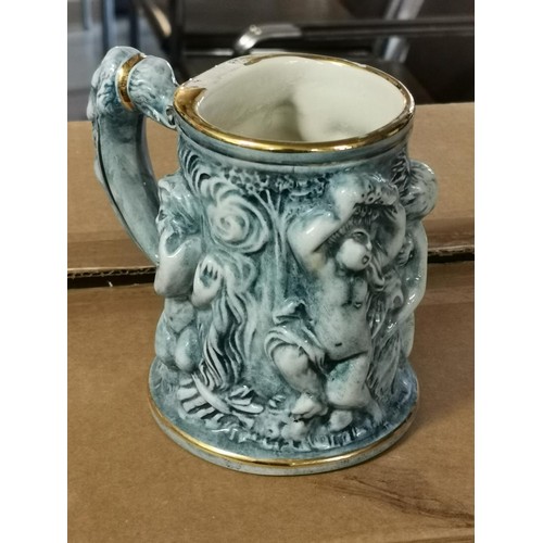 141 - 13 cm tall vintage Capodimonte blue with gold detail tankard, no lid and small nick on Rim