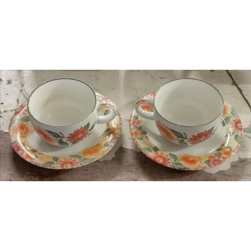 142 - Pair of 1994 royal Doulton expressions Sunburst cups and saucers