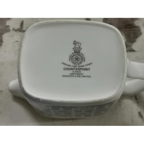 144 - Pair of Royal Doulton H5025 counterpoint milk jugs