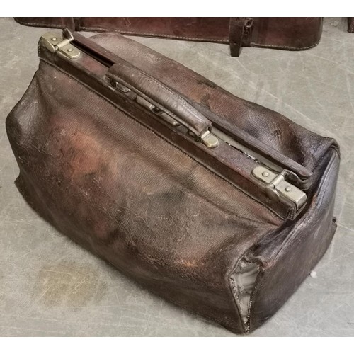 Sold at Auction: An oxblood leather Gladstone bag